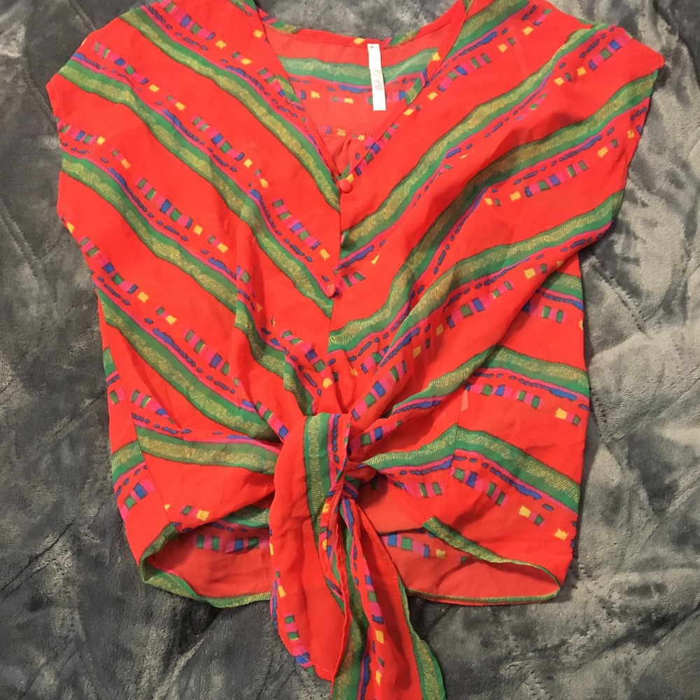 Red top with green stripes. Gently used from sway in Berkeley
